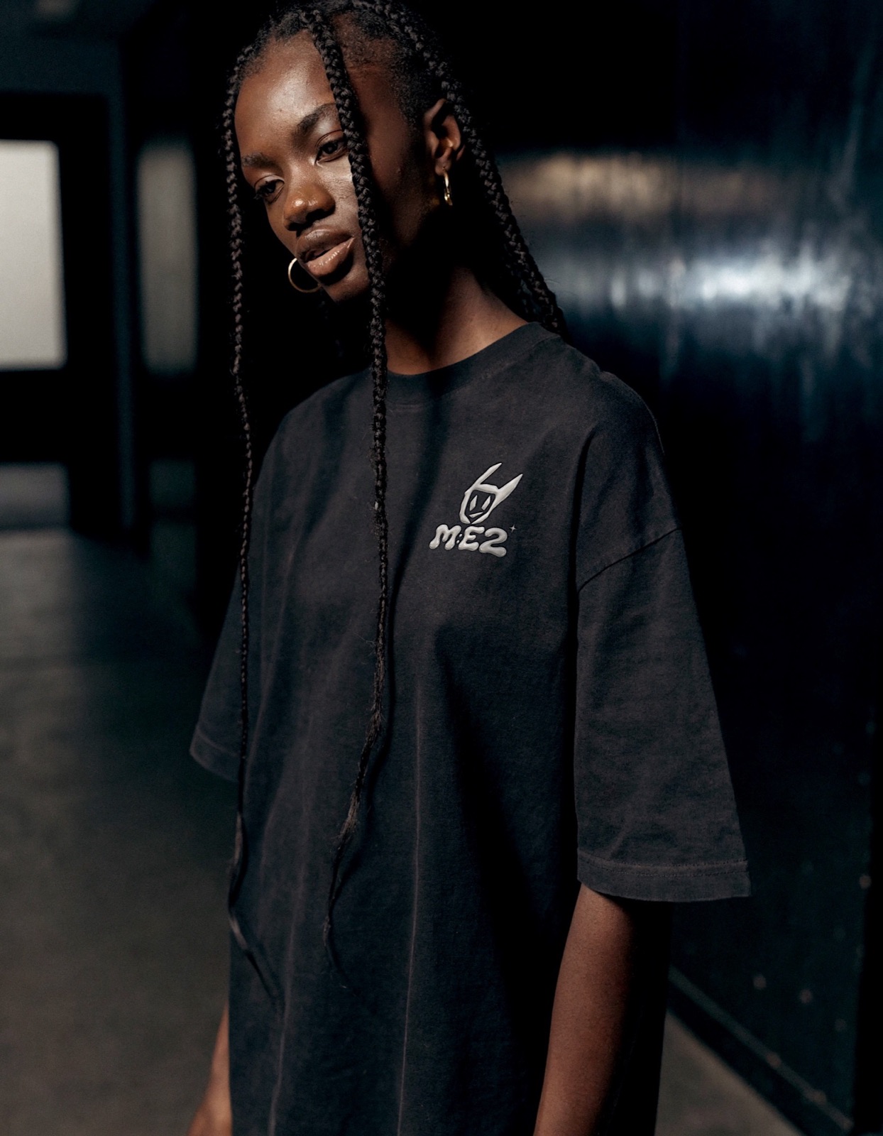 Fashion editorial portrait in an M:E2 shirt